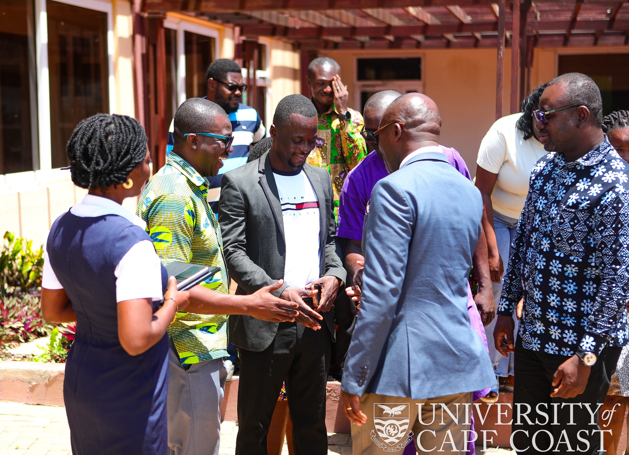 Prof. Denis Aheto(in suit) - Acting Vice-Chancellor, sharing handshake with some faculty members of SoPPS