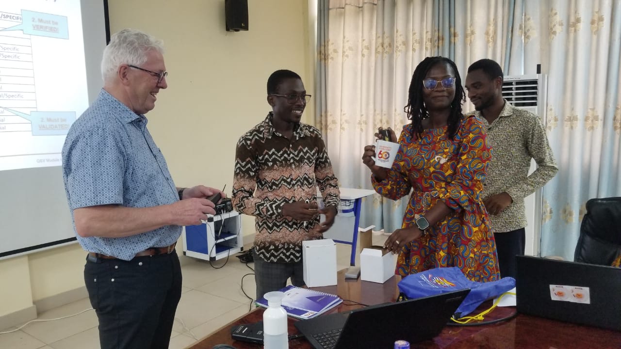 Jos Kessels receiving a gift of appreciation from the Prof. Elvis Ofori Ameyaw and the Mrs Esther Nimo